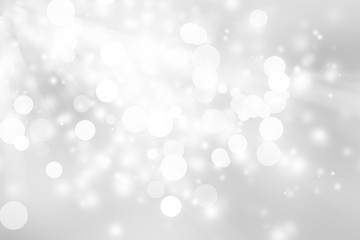 Obraz na płótnie Canvas white blur abstract background. bokeh Christmas blurred beautiful shiny Christmas lights