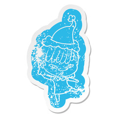 cartoon distressed sticker of a woman wearing santa hat