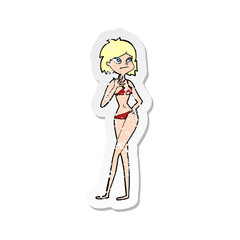 retro distressed sticker of a cartoon woman in bikini