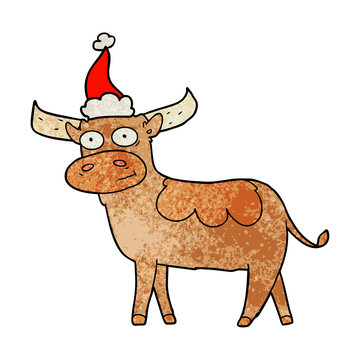 textured cartoon of a bull wearing santa hat