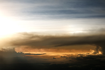 Fototapeta na wymiar Beautyful view from plane on the sky, sunset and cloud
