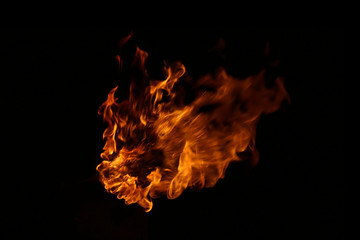 Fototapeta premium Fire flames on black background.