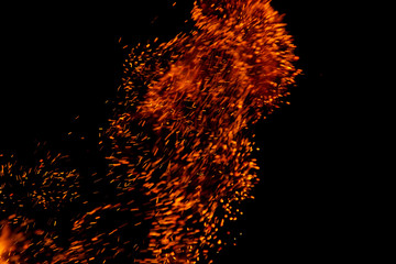 flame of fire with sparks on a black background