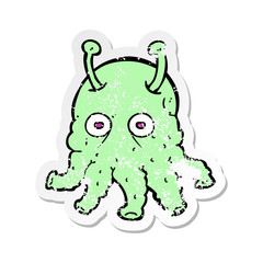 retro distressed sticker of a cartoon space alien