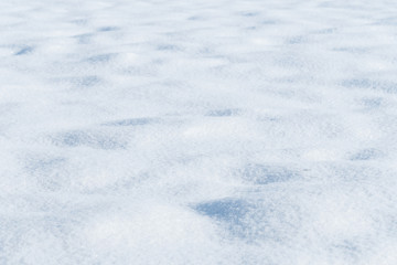 Fototapeta na wymiar background of fresh snow texture in blue tone