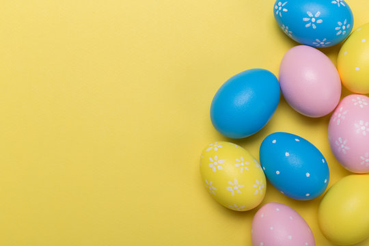 easter eggs on yellow pastel color background with space. Concept