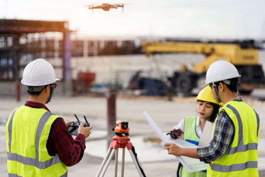 Civil Engineering Flying Drone Over Construction Site Survey For Land And Building Project.