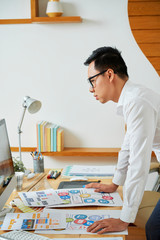 Graphic designer at his workplace