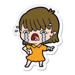 sticker of a cartoon girl crying