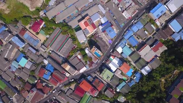 Drone fly down above the  road junction and streets at Patong,Phuket island,Thailand,zoom shot