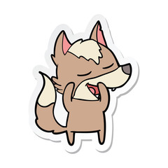 sticker of a cartoon wolf laughing