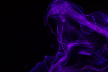 Colorful smoke close-up on a black background