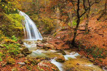 The natural attraction of the Crimean peninsula - a large waterfall Jur-Jur, a beautiful autumn landscape