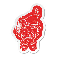 cartoon distressed sticker of a shouting bald man wearing santa hat
