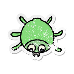 distressed sticker of a quirky hand drawn cartoon beetle