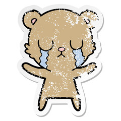 distressed sticker of a crying cartoon bear