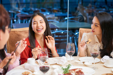 Woman laughing at good joke