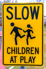 Close up view of Slow Children At Play sign