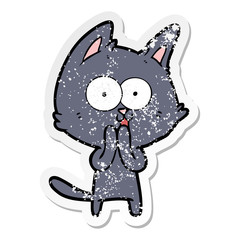 distressed sticker of a funny cartoon cat