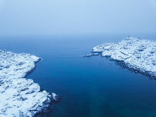 Shore Barents Sea. Kola Peninsula. Arctic Ocean winter landscape