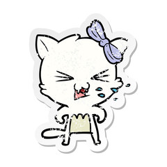 distressed sticker of a cartoon cat