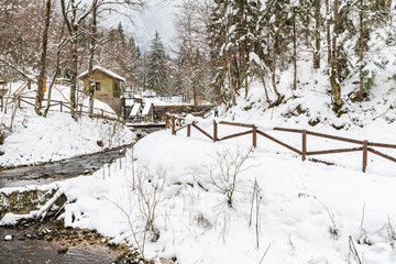 Snowfall on the Fusine lakes. Ghaccio and enchanting snow. Tarvisio, Friuli