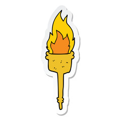 sticker of a cartoon flaming torch