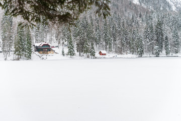 Snowfall on the Fusine lakes. Ghaccio and enchanting snow. Tarvisio, Friuli