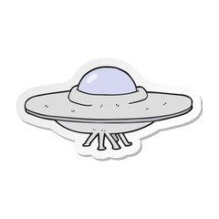 sticker of a cartoon flying saucer