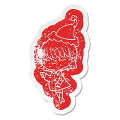 cartoon distressed sticker of a woman wearing santa hat