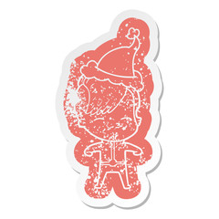 cartoon distressed sticker of a girl wearing futuristic clothes wearing santa hat