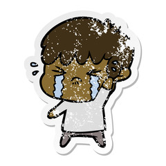 distressed sticker of a cartoon boy crying