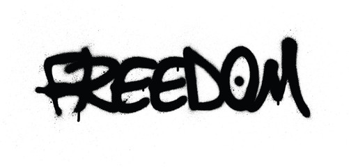 graffiti freedom word sprayed in black over white