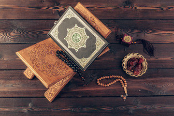 islamic holy book on wooden table