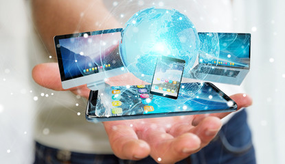 Businessman connecting tech devices and icons applications 3D rendering