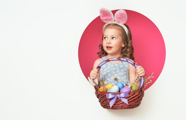 Girl with painted eggs