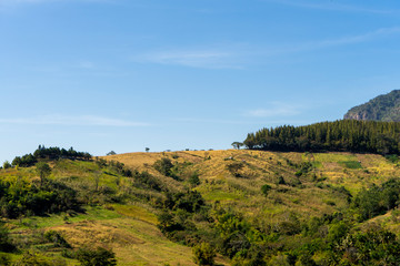 Mountain view with sky background.