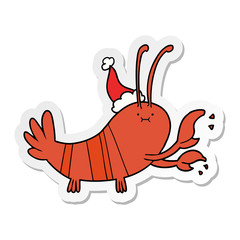 sticker cartoon of a lobster wearing santa hat