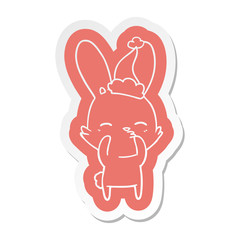 curious bunny cartoon  sticker of a wearing santa hat