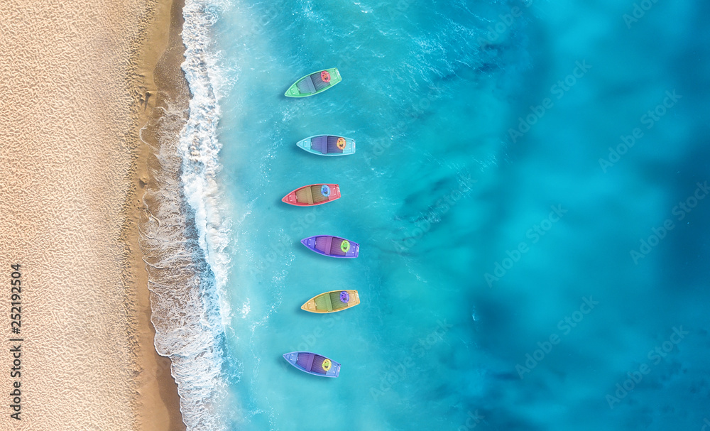 Wall mural boats from air. aerial view on sea in turkey. summer seascape with clear water in sunny day. top vie