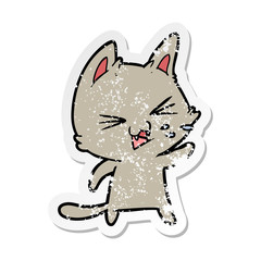 distressed sticker of a cartoon cat hissing