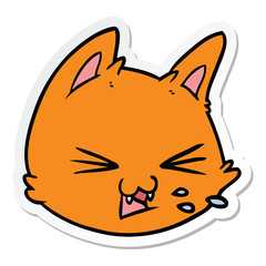 sticker of a spitting cartoon cat face