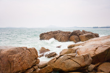 Waves crashing on rocks at coast