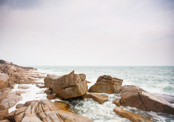 Waves crashing on rocks at coast
