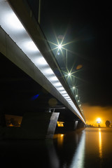 Bridge over river. Night scene.