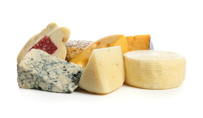 Assortment of tasty cheese on white background