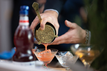 bartender making cocktail 