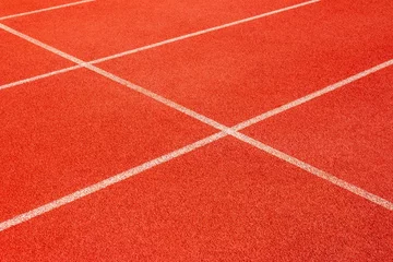 Gordijnen Red running track Synthetic rubber on the athletic stadium © Fotoglee