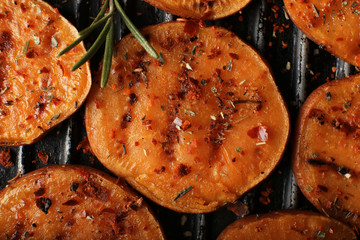 Tasty grilled sweet potato on pan