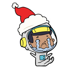 line drawing of a crying astronaut wearing santa hat